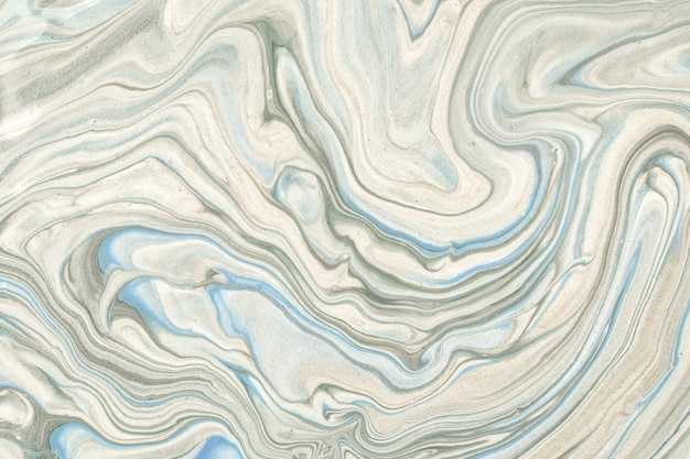 Abstract fluid art background light blue and gray colors. Liquid marble. Acrylic painting on canvas with ivory gradient. Watercolor backdrop with beige wavy pattern. Stone section.