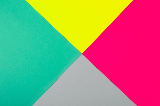 Abstract geometric background in glowing neon colors.