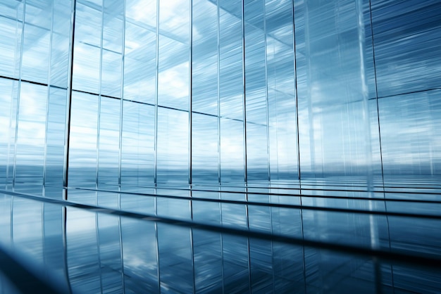 Abstract glass wall in modern office building with reflection