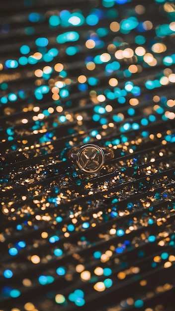 abstract glitter black gold blue lights background de focused