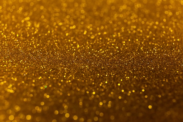 Abstract glitter shining lights background. De-focused lights