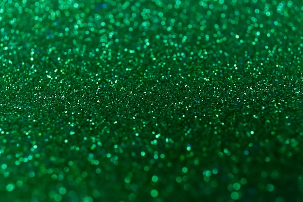 Abstract glitter shining lights background. De-focused lights