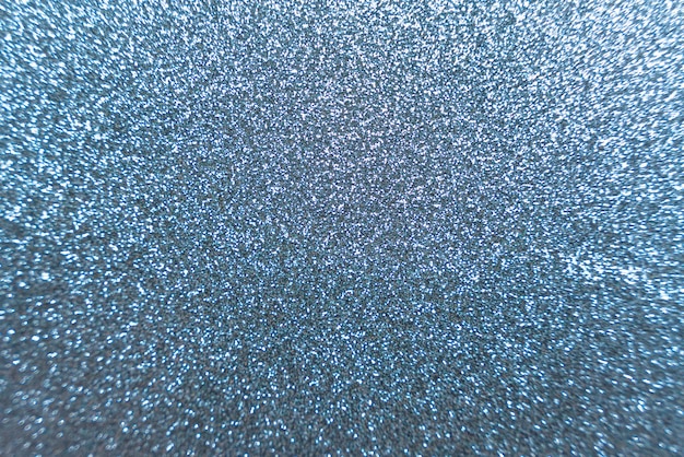 Abstract glittering blue background