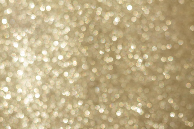 Abstract golden bokeh background defocused blurry sparkles