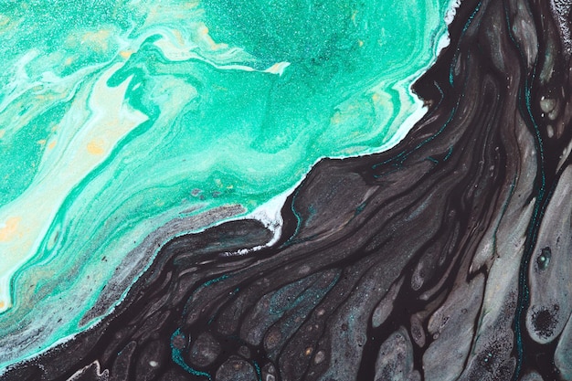 Abstract green black color background Multicolored fluid art Waves splashes and blots acrylic alcohol ink paints under water