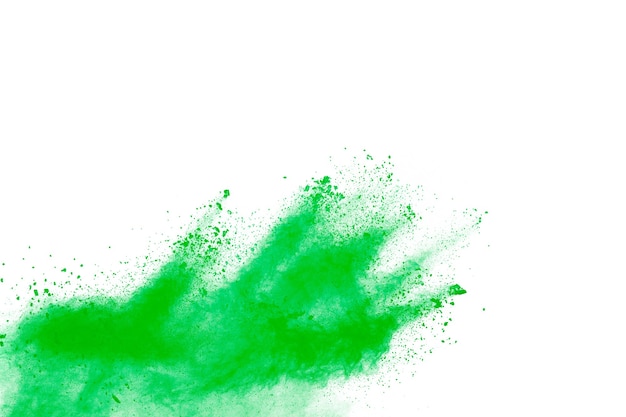 Abstract green powder explosion on white background.