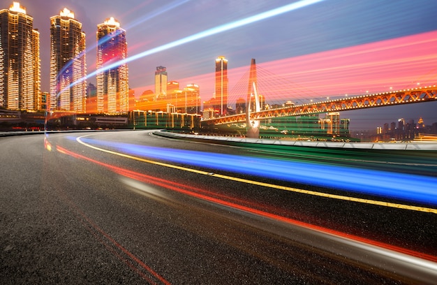 Abstract image of blur motion of cars on the city road at night,Modern urban architecture in Chongqing, China