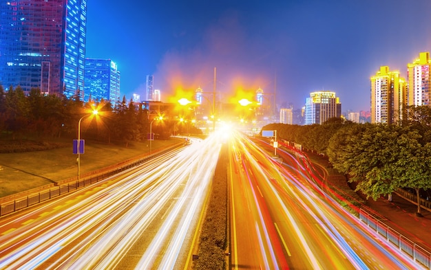 abstract image of blur motion of cars on the city road at night