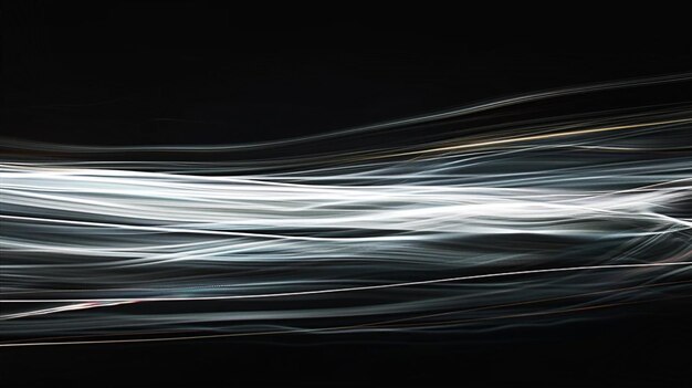 Photo abstract image of softly glowing light streaks against a black background creating a dynamic and my