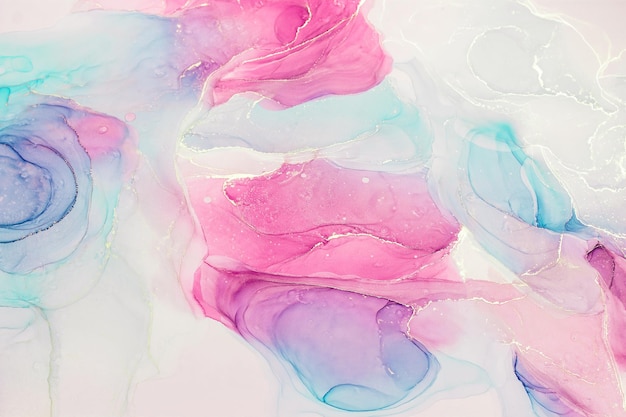 Abstract liquid ink painting background in pink blue colors