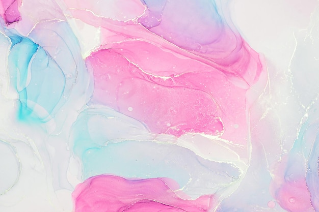 Abstract liquid ink painting background in pink blue colors