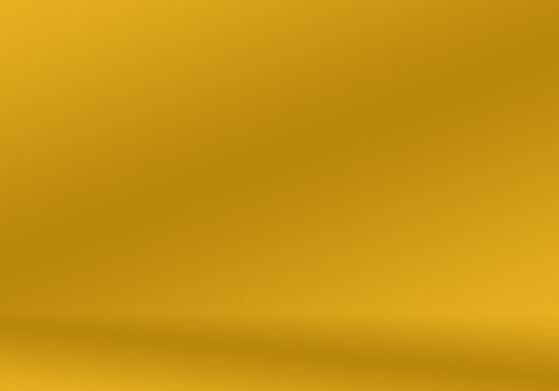 Abstract Luxury Gold yellow gradient studio wall, well use as background,layout,banner and product presentation.