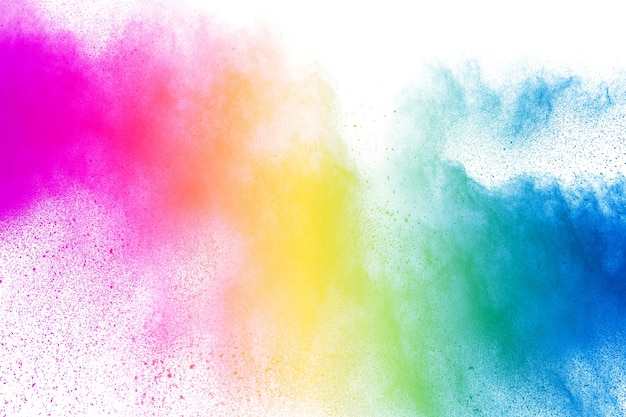 Abstract multi color powder explosion on white background. 