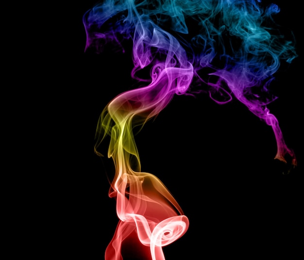 Abstract multicolored smoke on a dark background