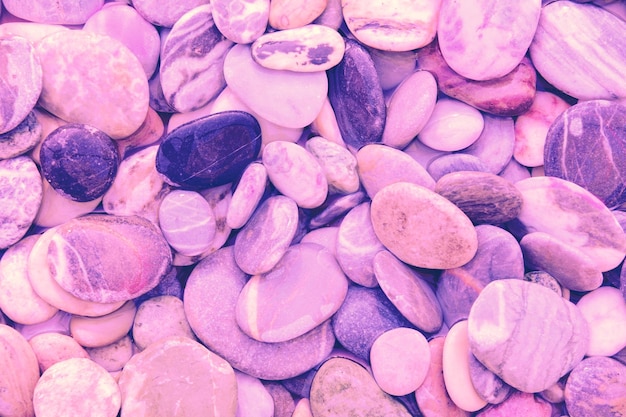 Abstract nature pebbles background Pink pebbles texture Stone background