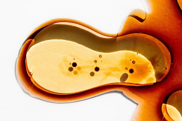 Abstract oil painting Creative wet liquid illustrations Fluid art Blobs and drops on paper texture Orange yellow and white colors