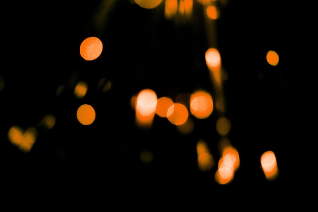 abstract orange sparkler overlays elegant texture blur sparkling on black