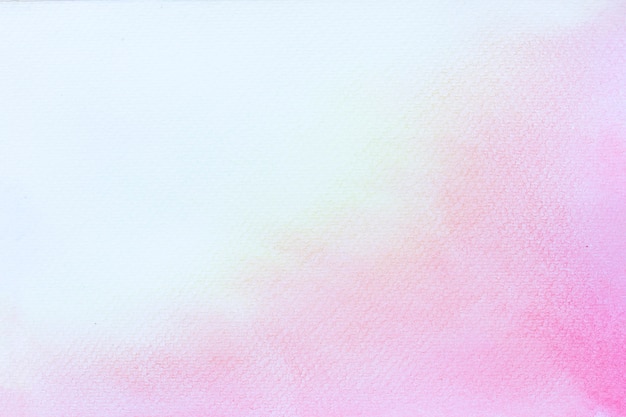 Abstract pink watercolor on white background. The color splashing in the paper. It is a hand drawn.