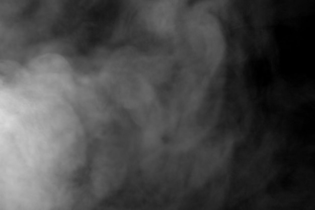 Photo abstract powder or smoke isolated on black backgroundout of focus