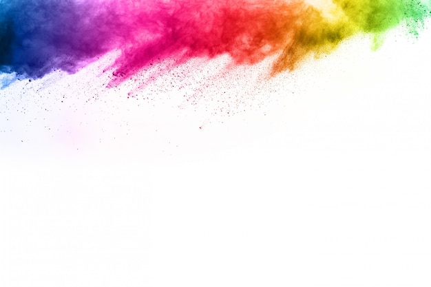 Abstract powder splatted background. Colorful powder explosion on white background. 