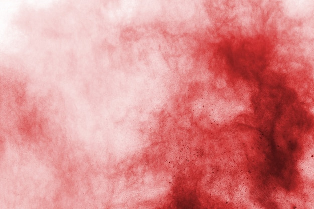 abstract red dust explosion on white background. 