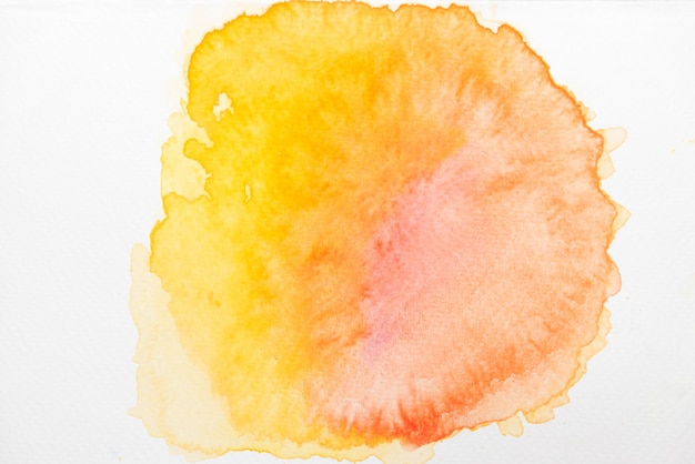 Abstract red, yellow and orange watercolor on paper