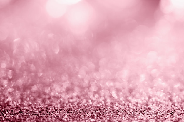 Abstract rose gold glitter sparkle texture with bokeh background