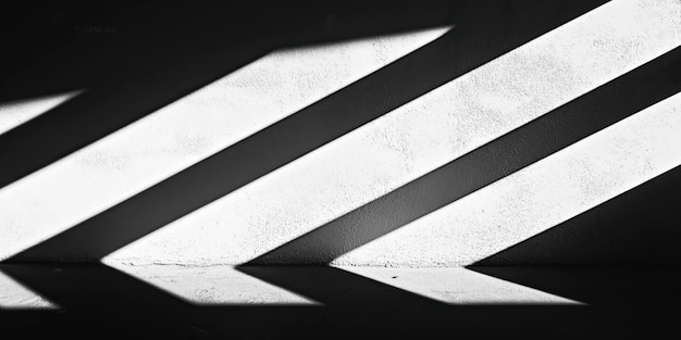 Abstract shadows and light on a textured wall minimalist black and white design photography