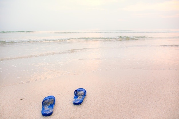 Abstract Shoes on the beach in the morning sunlight Illustration in a comfortable vacation by the sea