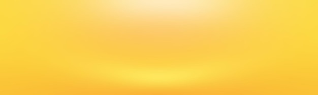 Abstract solid of shining yellow gradient studio wall room background