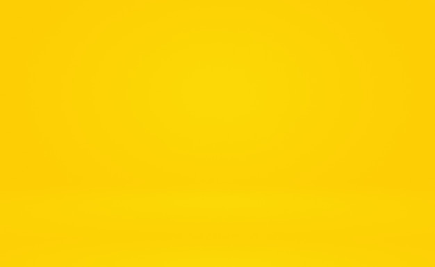 Abstract solid of shining yellow gradient studio wall room background.