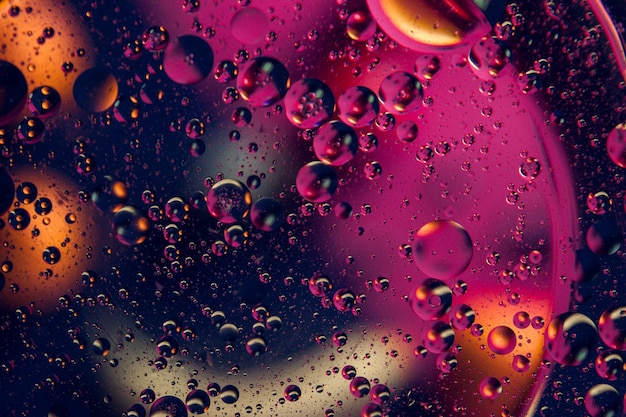 Abstract space background Water drops of different colours