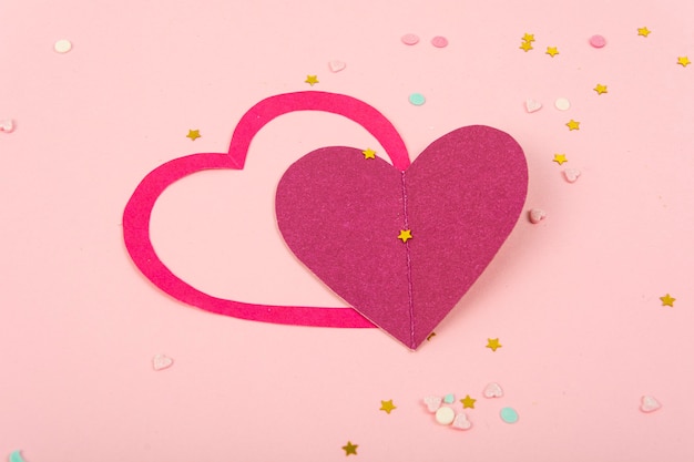 Abstract surface with Paper Hearts, confetti for Valentine`s Day