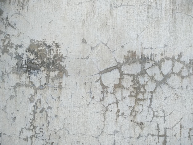 Abstract texture background of porous, cracked and weathered cement wall