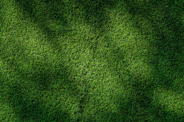 Abstract  top view green color of artificial grass background texture