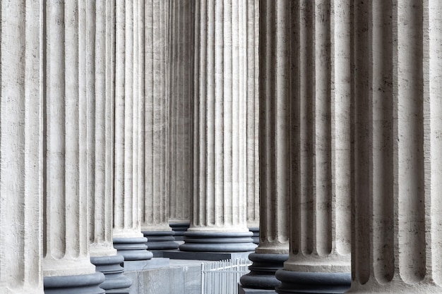 Abstract view of lots of embossed columns with deep shadows looking like lots of vertical lines