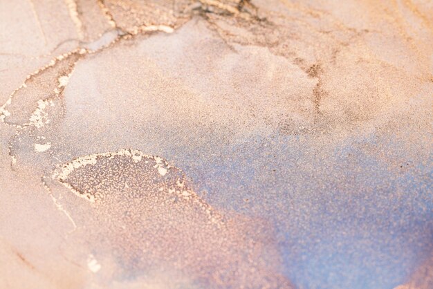 Photo abstract watercolor swirls in soft peach and lavender hues