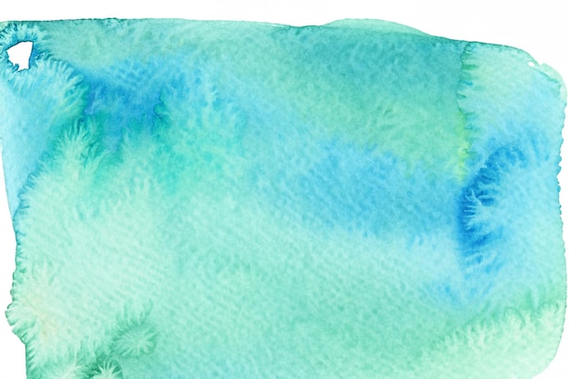 Abstract watercolor wash in blue and green colors on white background