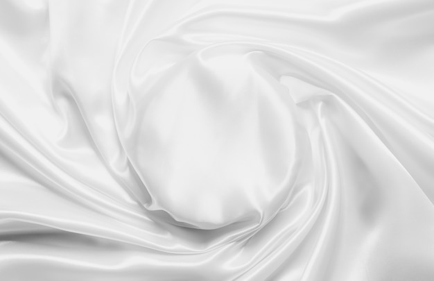 Abstract White Satin Silky Cloth for background, Fabric Textile Drape with Crease Wavy Folds.with soft waves,waving in the wind.