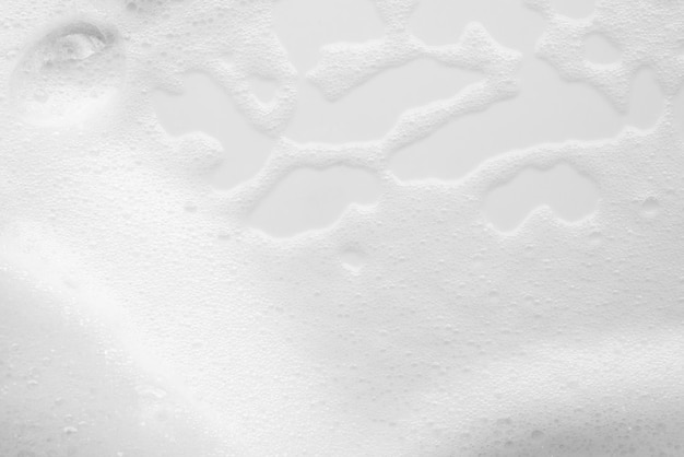 Photo abstract white soap foam bubbles texture on white background