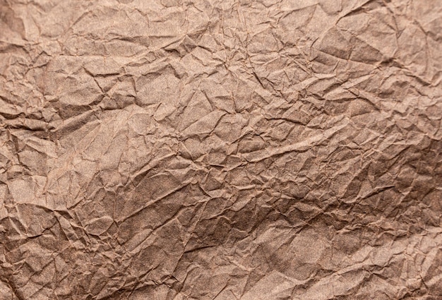 Abstract wrinkled wrinkled texture of wrapping brown paper Abstract background