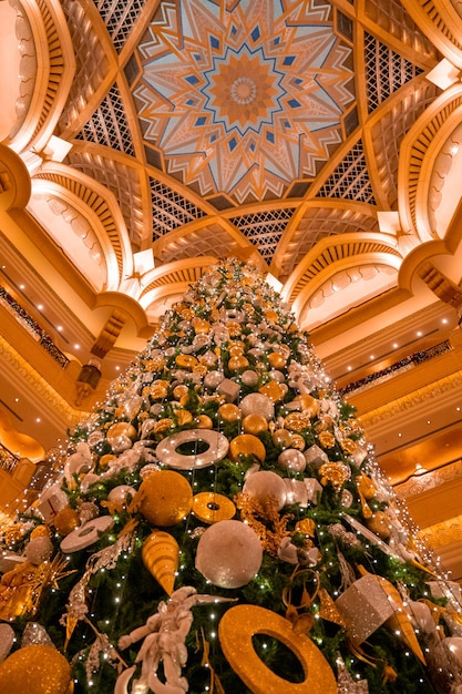 Abu-Dhabi, UAE, May 16 2020. Beautiful Christmas tree in Emirates Palace in Abu Dhabi with Christmas decorations.