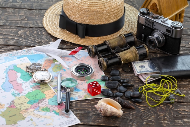 Accessories and items for traveling on the table in composition