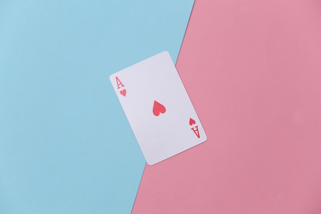 Ace of hearts on pink blue background.