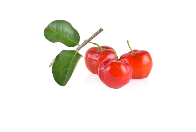 Acerola small cherry fruit with leaf isolated on white background