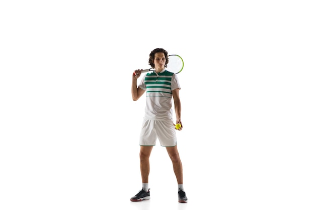 Achievement Young caucasian professional sportsman playing tennis isolated on white background Training  in motion action Power and energy Movement ad sport healthy lifestyle concept