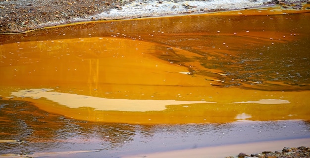 Photo acidic waters of rio tinto with iron sedimentation