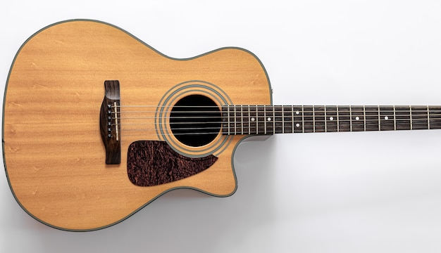 Acoustic guitar on a white background, top view, copy space.