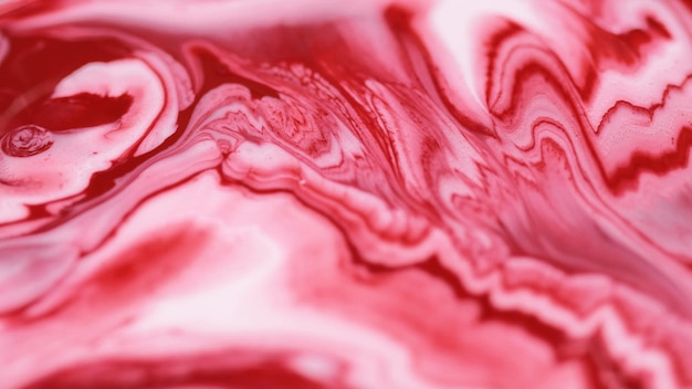 Acrylic fluid spill liquid marble texture blur white red color paint swirl mix layers ink drip