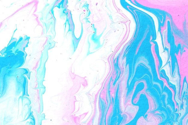 Acrylic texture made in fluid pour technique Background in pink white and blue colors